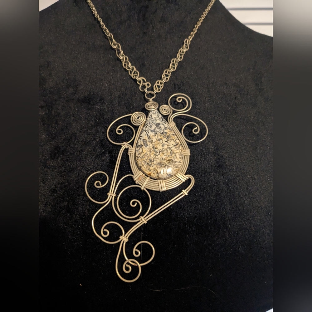 New Handmade necklace with petrified snail shell